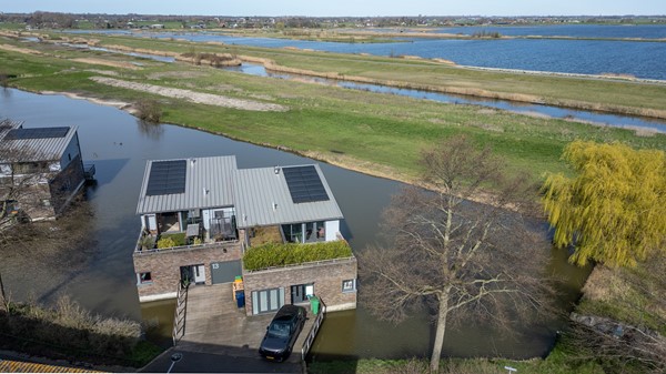 Experience the beautiful natural landscape from this unique waterfront home